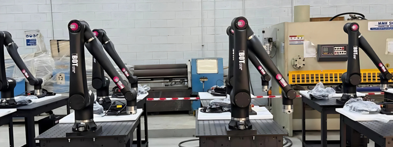 Row of ABICOR BINZEL iBOTone welding cobots.